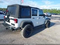 2015 Jeep Wrangler Unlimited — photo 4 of 16 | VIN 1C4BJWDG9FL541720
