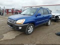 2005 Kia Sportage — photo 2 of 16 | VIN KNDJE723257046773