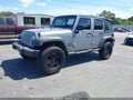 2015 Jeep Wrangler Unlimited — photo 2 of 16 | VIN 1C4BJWDG0FL637199