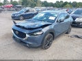 2024 Mazda CX-30 — photo 2 of 16 | VIN 3MVDMBDY8RM628060
