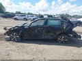 2016 Kia Optima — photo 13 of 15 | VIN 5XXGV4L20GG048997