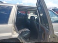 1996 Jeep Grand Cherokee — photo 8 of 20 | VIN 1J4GZ78Y8TC243396
