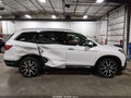 2020 Honda Pilot — photo 13 of 17 | VIN 5FNYF6H09LB053620