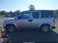 2009 Honda Element — photo 14 of 16 | VIN 5J6YH28709L004001
