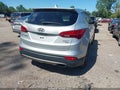 2016 Hyundai Santa Fe — photo 4 of 15 | VIN 5XYZTDLBXGG351411