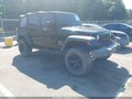 2007 Jeep Wrangler Unlimited — photo 1 of 16 | VIN 1J8GA39177L163027
