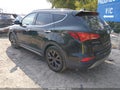 2017 Hyundai Santa Fe — photo 3 of 16 | VIN 5XYZW4LA0HG435849