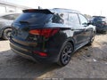 2017 Hyundai Santa Fe — photo 4 of 16 | VIN 5XYZW4LA0HG435849