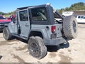 2015 Jeep Wrangler Unlimited — photo 3 of 14 | VIN 1C4BJWDG1FL660541