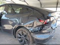 2025 Tesla Model Y — photo 6 of 15 | VIN 7SAYGDED3SF320633