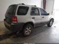 2005 Ford Escape — photo 4 of 10 | VIN 1FMYU93105KC70983