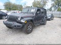 2021 Jeep Wrangler Unlimited — photo 2 of 16 | VIN 1C4HJXFNXMW564642