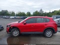 2014 Mazda CX-5 — photo 13 of 15 | VIN JM3KE4BE4E0404797