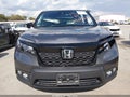 2021 Honda Passport — photo 13 of 19 | VIN 5FNYF7H57MB010669
