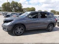 2021 Honda Passport — photo 15 of 19 | VIN 5FNYF7H57MB010669