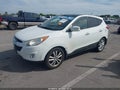 2012 Hyundai Tucson — photo 2 of 16 | VIN KM8JUCAC9CU509693