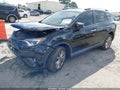 2018 Toyota RAV4 — photo 2 of 16 | VIN 2T3YFREV1JW505374