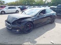 2015 Tesla Model S — photo 2 of 15 | VIN 5YJSA1H46FF084001