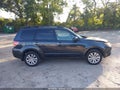 2012 Subaru Forester — photo 13 of 16 | VIN JF2SHADC7CH411009