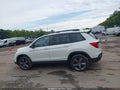2019 Honda Passport — photo 14 of 16 | VIN 5FNYF8H95KB003872