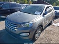 2013 Hyundai Santa Fe — photo 2 of 10 | VIN 5XYZWDLA2DG043479