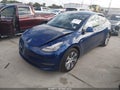 2020 Tesla Model Y — photo 2 of 20 | VIN 5YJYGDEE5LF010670