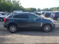 2013 Cadillac SRX — photo 14 of 17 | VIN 3GYFNGE31DS553787