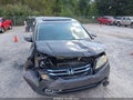 2014 Honda Odyssey — photo 6 of 16 | VIN 5FNRL5H91EB019826