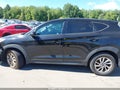 2018 Hyundai Tucson — photo 14 of 16 | VIN KM8J2CA45JU710616
