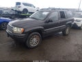 2004 Jeep Grand Cherokee — photo 2 of 11 | VIN 1J4GX58NX4C422170