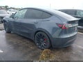 2022 Tesla Model Y — photo 3 of 15 | VIN 7SAYGDEFXNF455503