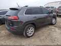 2015 Jeep Cherokee — photo 4 of 11 | VIN 1C4PJLCS3FW531130