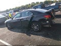 2015 Acura TLX — photo 14 of 16 | VIN 19UUB1F58FA015645