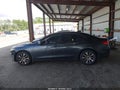 2015 Acura TLX — photo 15 of 17 | VIN 19UUB1F55FA023413