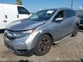 2017 Honda CR-V — photo 2 of 16 | VIN 2HKRW1H93HH505480