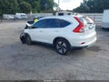 2016 Honda CR-V — photo 3 of 16 | VIN 5J6RM3H94GL009609