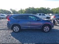 2014 Honda CR-V — photo 13 of 17 | VIN 2HKRM4H71EH625327