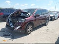 2017 Honda Pilot — photo 2 of 17 | VIN 5FNYF5H84HB031953
