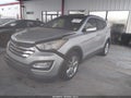 2015 Hyundai Santa Fe — photo 2 of 16 | VIN 5XYZW4LA1FG256703