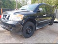 2015 Nissan Armada — photo 2 of 16 | VIN 5N1AA0NE5FN603409