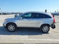 2009 Honda CR-V — photo 14 of 16 | VIN JHLRE387X9C014823