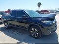 2019 Honda Ridgeline — photo 13 of 16 | VIN 5FPYK2F50KB000359