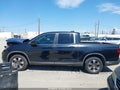 2019 Honda Ridgeline — photo 14 of 16 | VIN 5FPYK2F50KB000359
