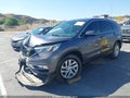 2016 Honda CR-V — photo 2 of 16 | VIN 3CZRM3H51GG707623