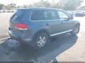 2006 Volkswagen Touareg — photo 4 of 11 | VIN WVGZG77L16D009217