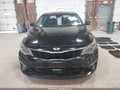2019 Kia Optima — photo 12 of 16 | VIN 5XXGW4L25KG324838