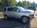 2013 Honda Pilot — photo 14 of 17 | VIN 5FNYF3H59DB020662