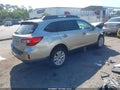 2016 Subaru Outback — photo 4 of 15 | VIN 4S4BSBFC4G3341616