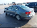 2015 Volkswagen Jetta — photo 3 of 16 | VIN 3VWD07AJ1FM338060