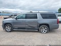 2018 Chevrolet Suburban — photo 14 of 17 | VIN 1GNSKHKC2JR213447